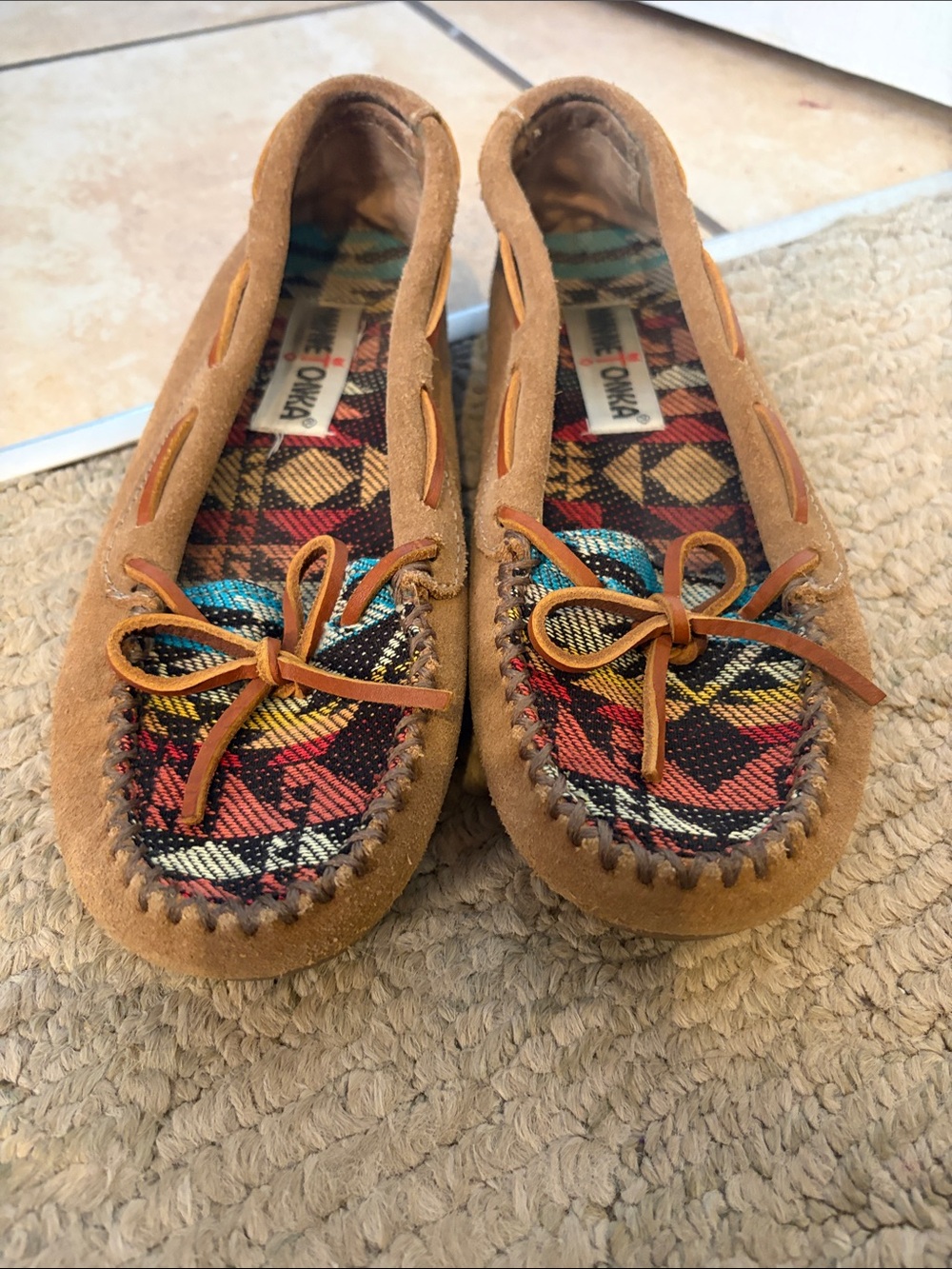 Minnetonka Tan Suede Moccasins with Multicolor Plaid Insole